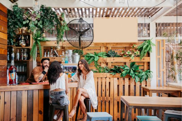 Modern cafe interior with people relaxing indoors in Sevilla